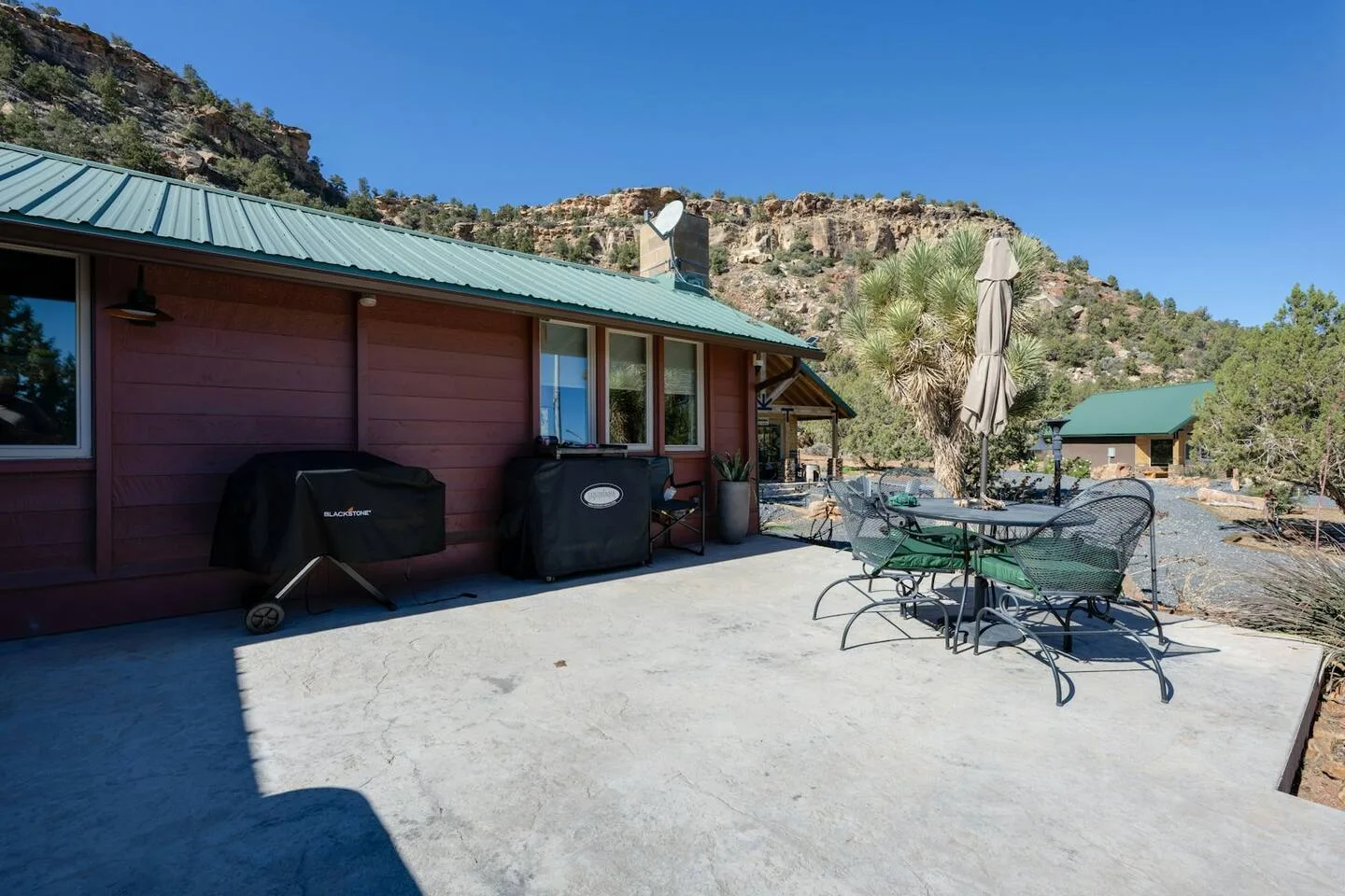 Anasazi Cliffs Lodging property at sunset